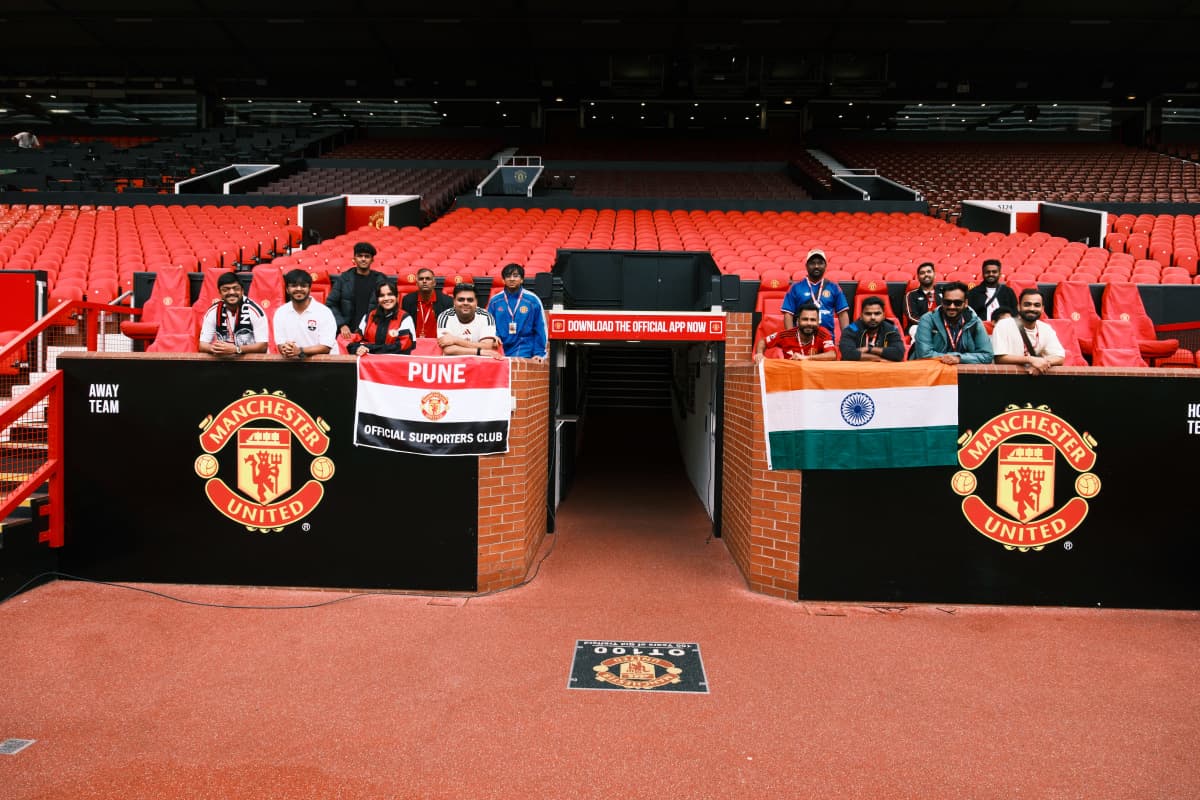 Standing inside the iconic player tunnel at Old Trafford where Manchester United legends step onto the pitch.