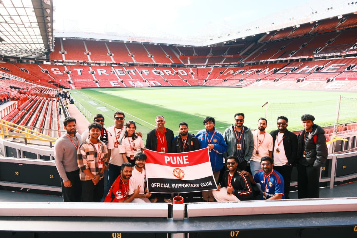 Standing pitchside by the dugout at Old Trafford during the exclusive supporters club tour.
